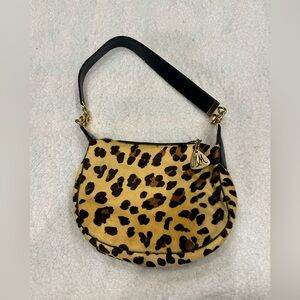 Vintage fur Morris Moskowitz bag in leopard with belt. Rare steal of a price